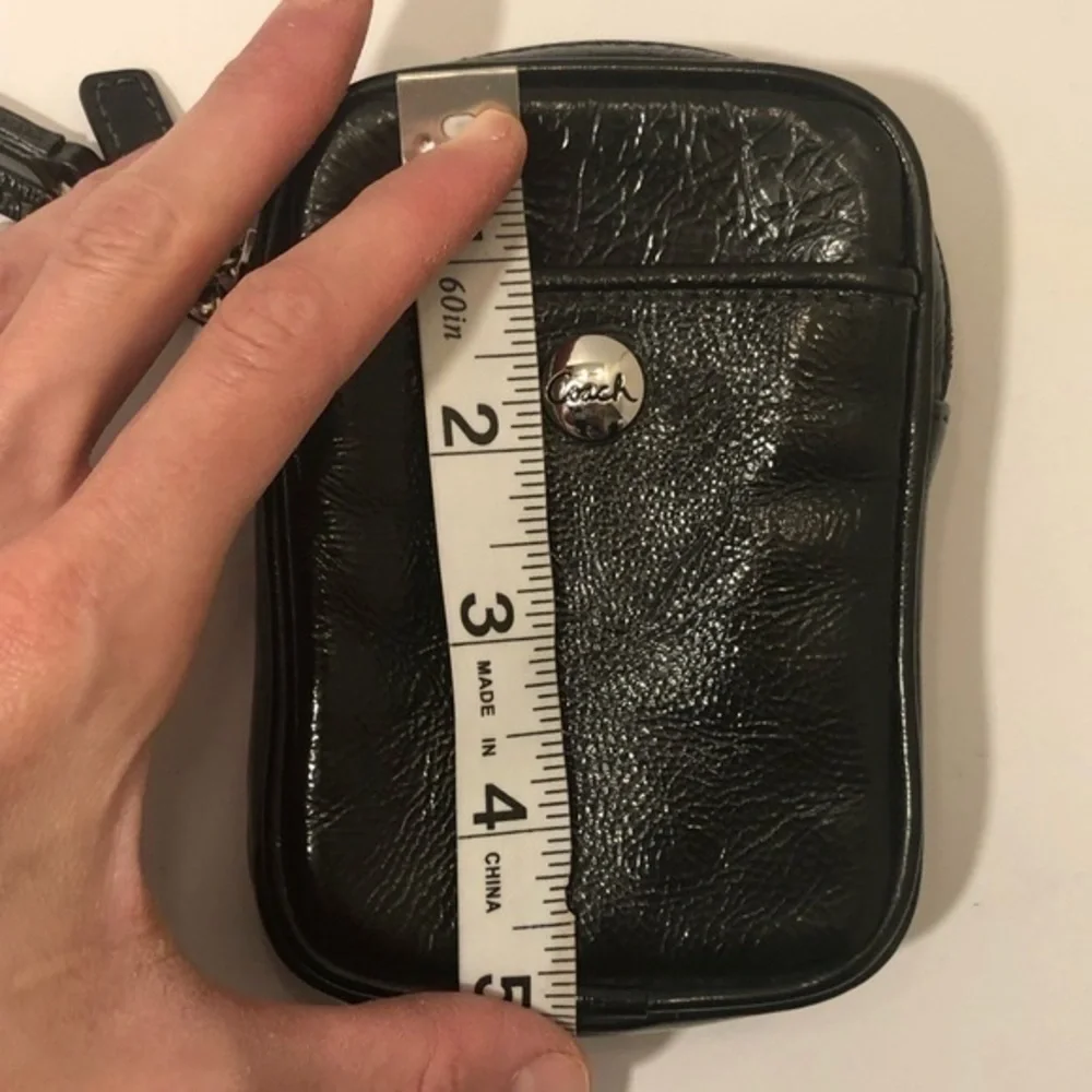 Coach black patent leather wristlet mini bag